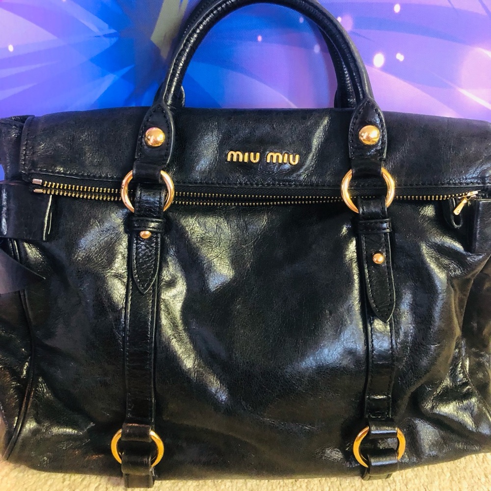 Miu Miu Black Leather with Gold Accents